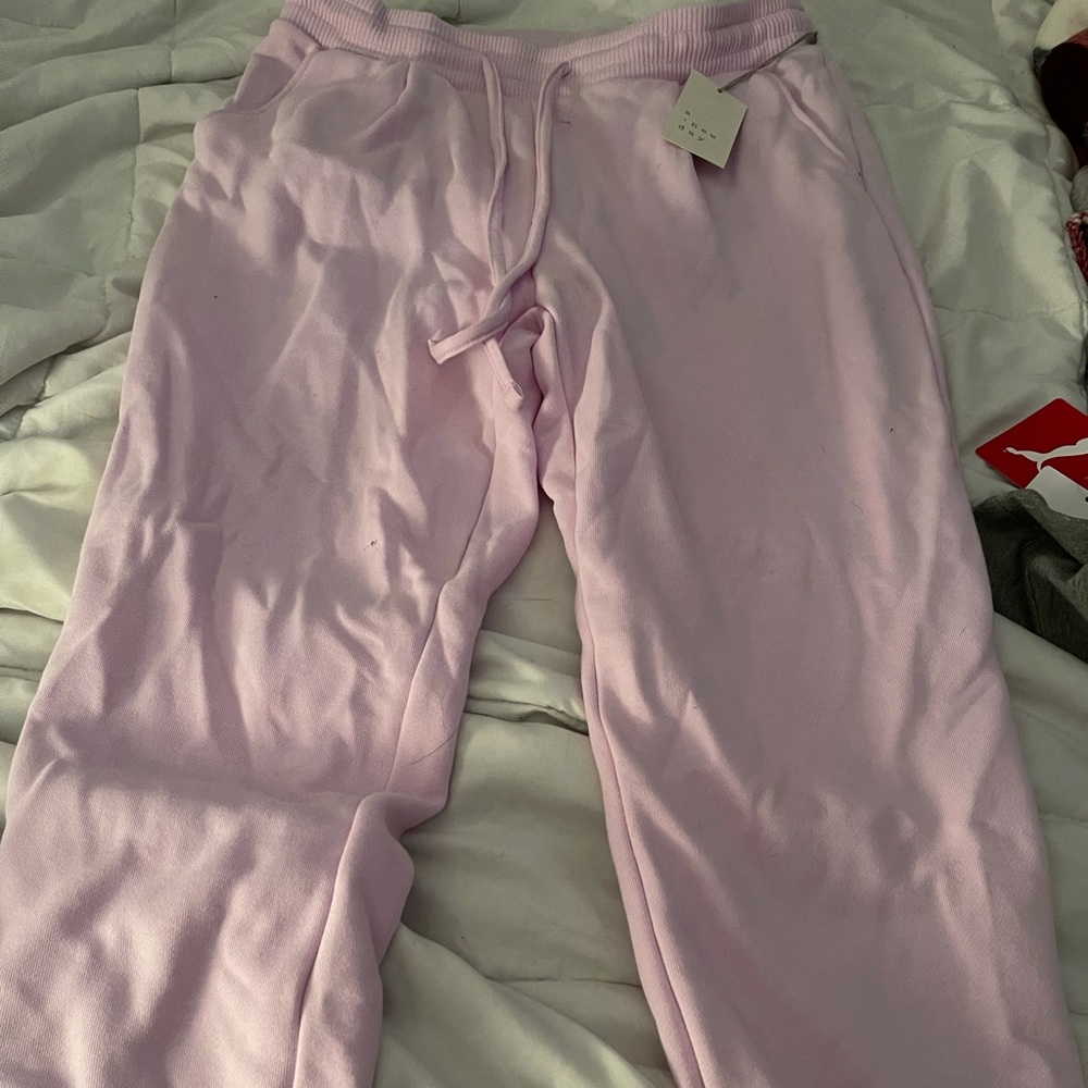 Light pink medium sweatpants.
